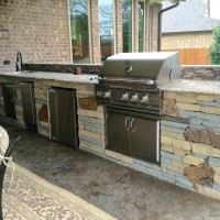 Outdoor Living Space: Houston Patio Features Mixed Stone