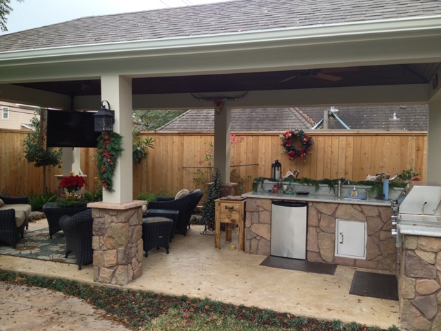 Poolside Patio featuring Stone Kitchen and Bar