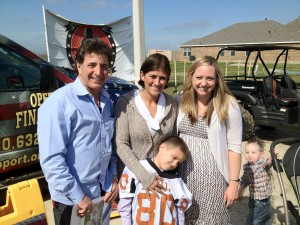 Wayne Franks, owner of Outdoor Homescapes of Houston, with family the company helped as part of Operation Finally Home. The charity helps build homes for returning soldiers and widows of the fallen. For more on Outdoor Homescapes' community giving, see "About Us" at www.outdoorhomescapes.com