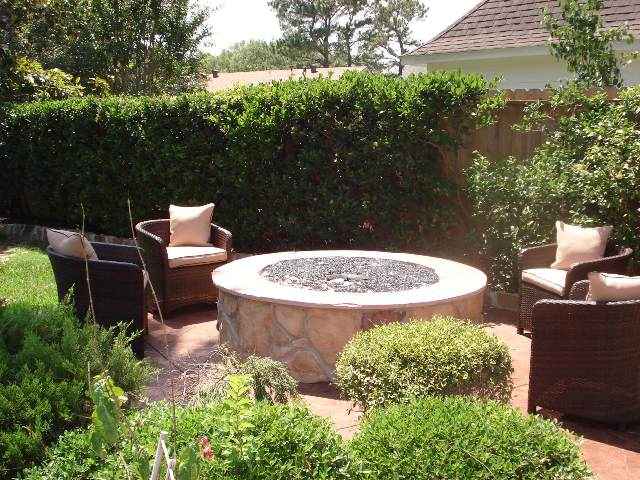 Even though Houston fire pits typically beckon a crowd, they also provide an ideal get-away in a world of distractions, worries and obligations. This intimate setting, designed and built by Outdoor Homescapes of Houston, with a fire in the middle, creates a focal point, a sense of calm and an infusion of energy. More at www.outdoorhomescapes.com