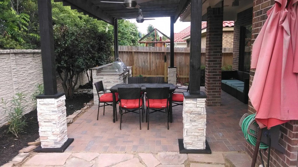 Houston patio designers Gretchen Kliafas and Kristy Buel Franks worked on this covered patio with an arbor and outdoor kitchen. More at www,outdoorhomescapes.com