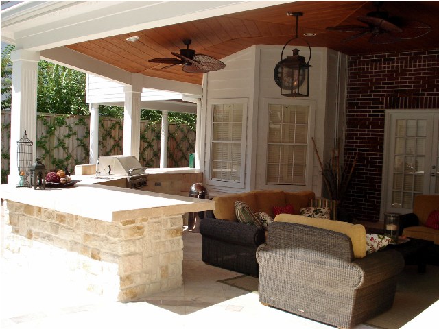 Houston patio covers like this one by Outdoor Homescapes of Houston offer the ideal spot for watching football on TV outside in fall. More at www.outdoorhomescapes.com