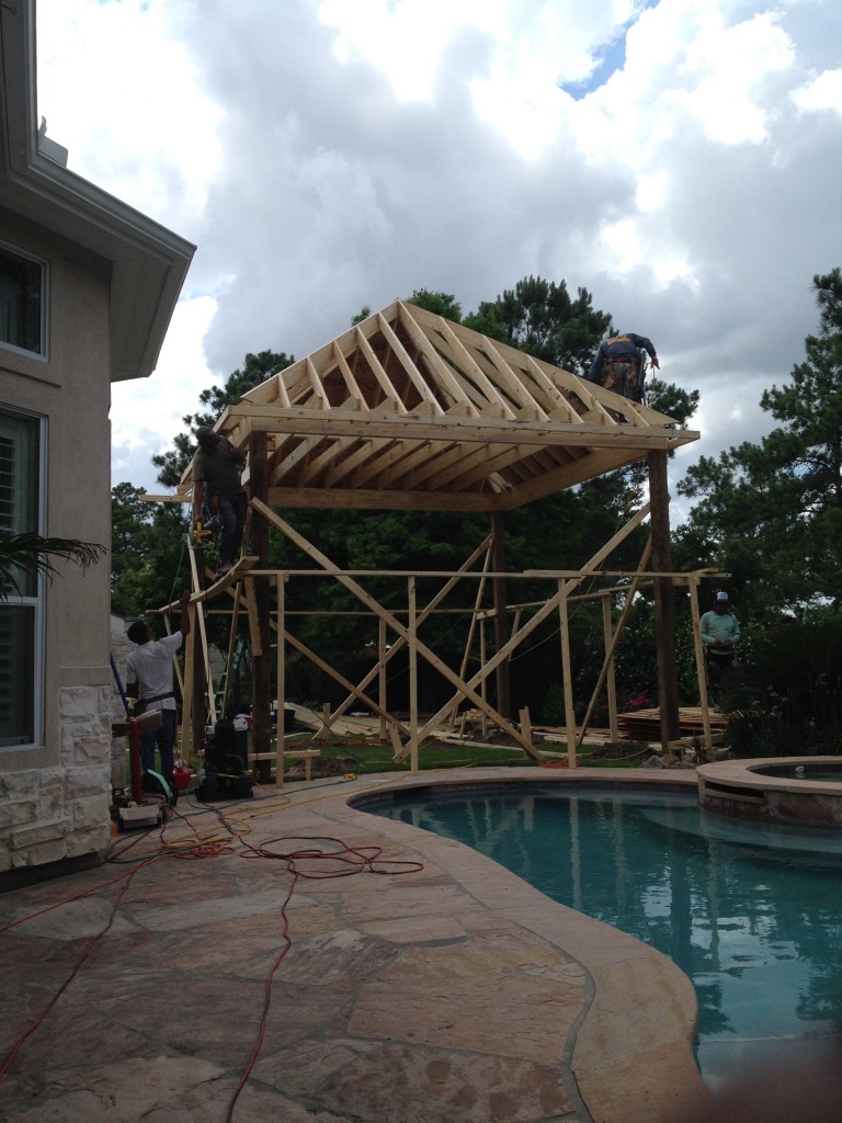 This Houston outdoor sitting area is shown while under construction by Outdoor Homescapes of Houston. When finished, it will contain an outdoor sitting area next to a cozy fireplace. More at www.outdoorhomescapes.com.