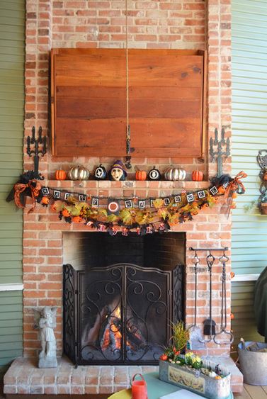 Looking for Halloween patio decorating ideas in 2014? How about this Rumford fireplace decked out with gothic candlestick decorations, metallic pumpkins and playful banners? This Houzz ideabook is one of the Halloween outdoor living space decor ideas shared by Outdoor Homescapes of Houston on its blog. More at www.outdoorhomescapes.com