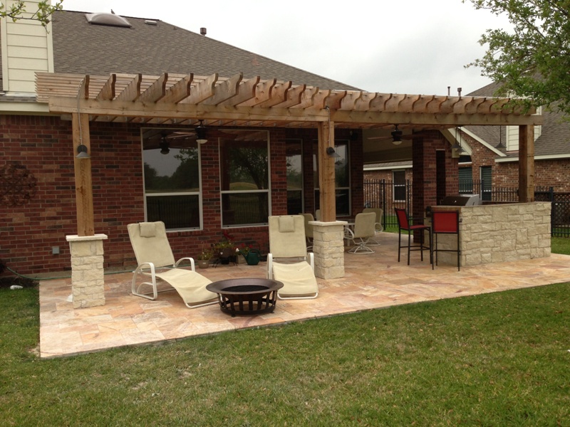 This Houston patio addition by Outdoor Homescapes of Houston is about 450 square feet with a double pergola and outdoor kitchen. More at www.outdoorhomescapes.com/blog