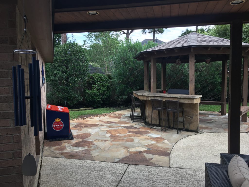 A large covered patio with an 800-square-foot roof extension replaced this small, not-so-waterproof pavilion where a Spring, TX often entertained friends and family. More on Homescapes of Houston's blog, at www.outdoorhomescapes.com/blog